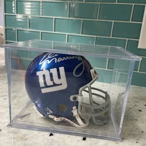 Eli Manning Autographed Mini Helmet. W Cert and clear case